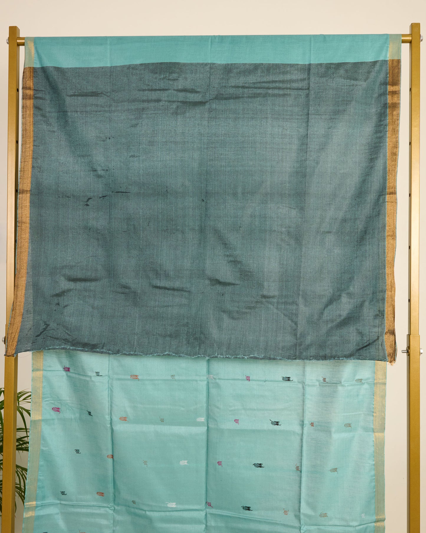 Blue Kosa Silk Saree with colourful silk thread extra weft motifs on display