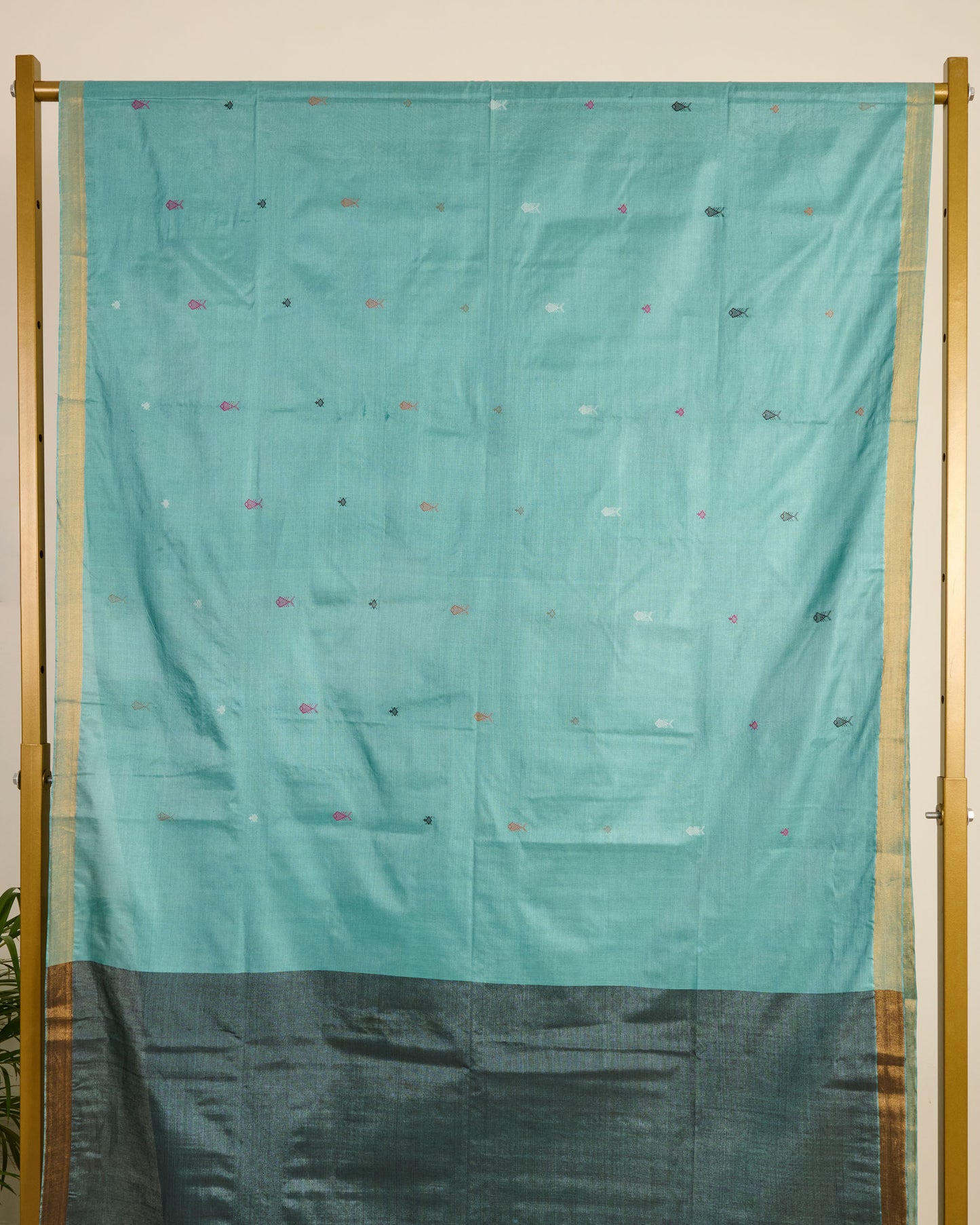 Blue Kosa Silk Saree with colourful silk thread extra weft motifs on display