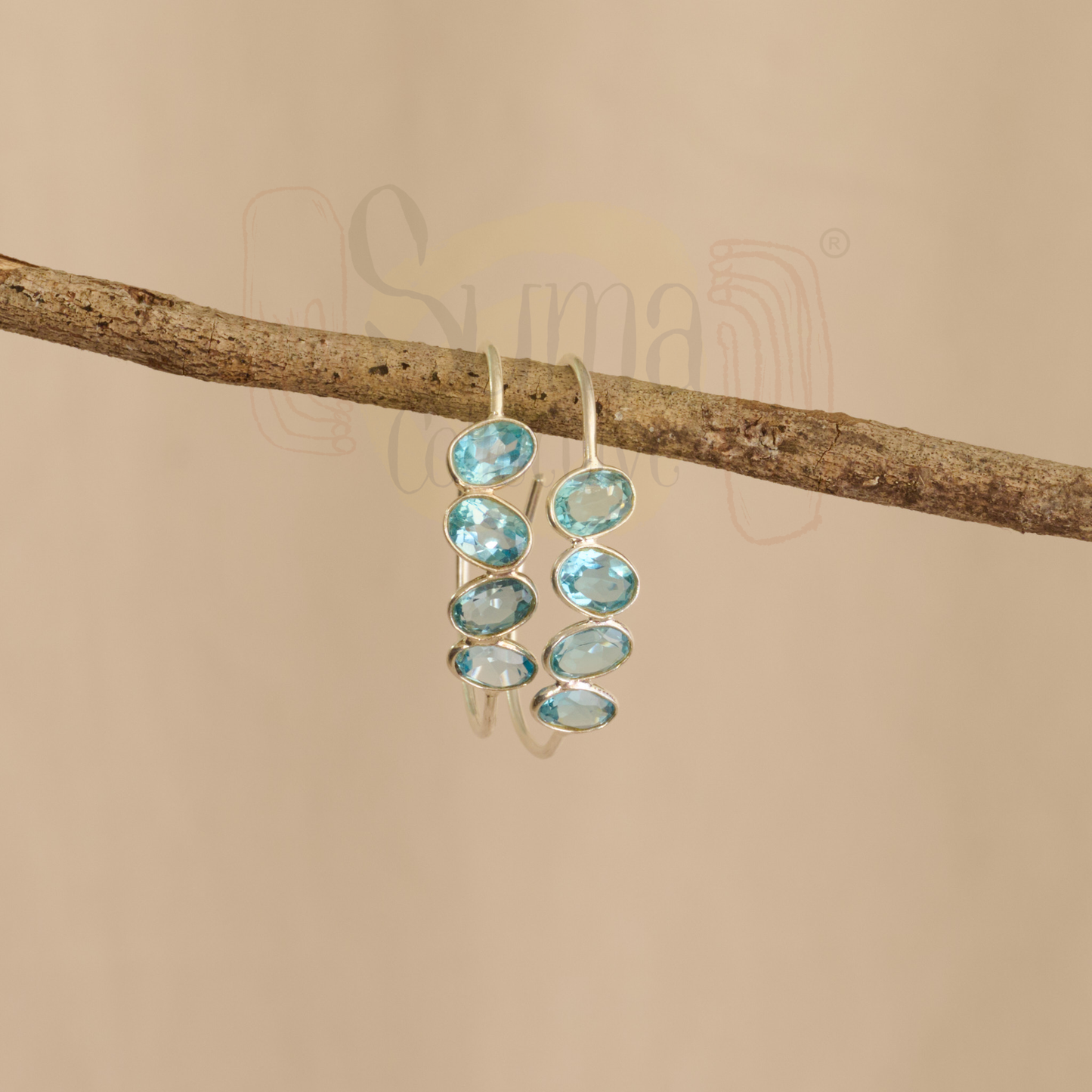 Mavi Blue Topaz Silver Hoop Earrings