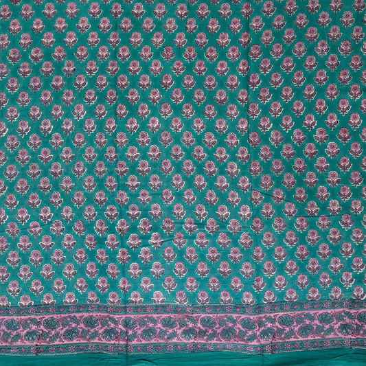 Teal cotton saree with pink Sanganeri floral block print.
