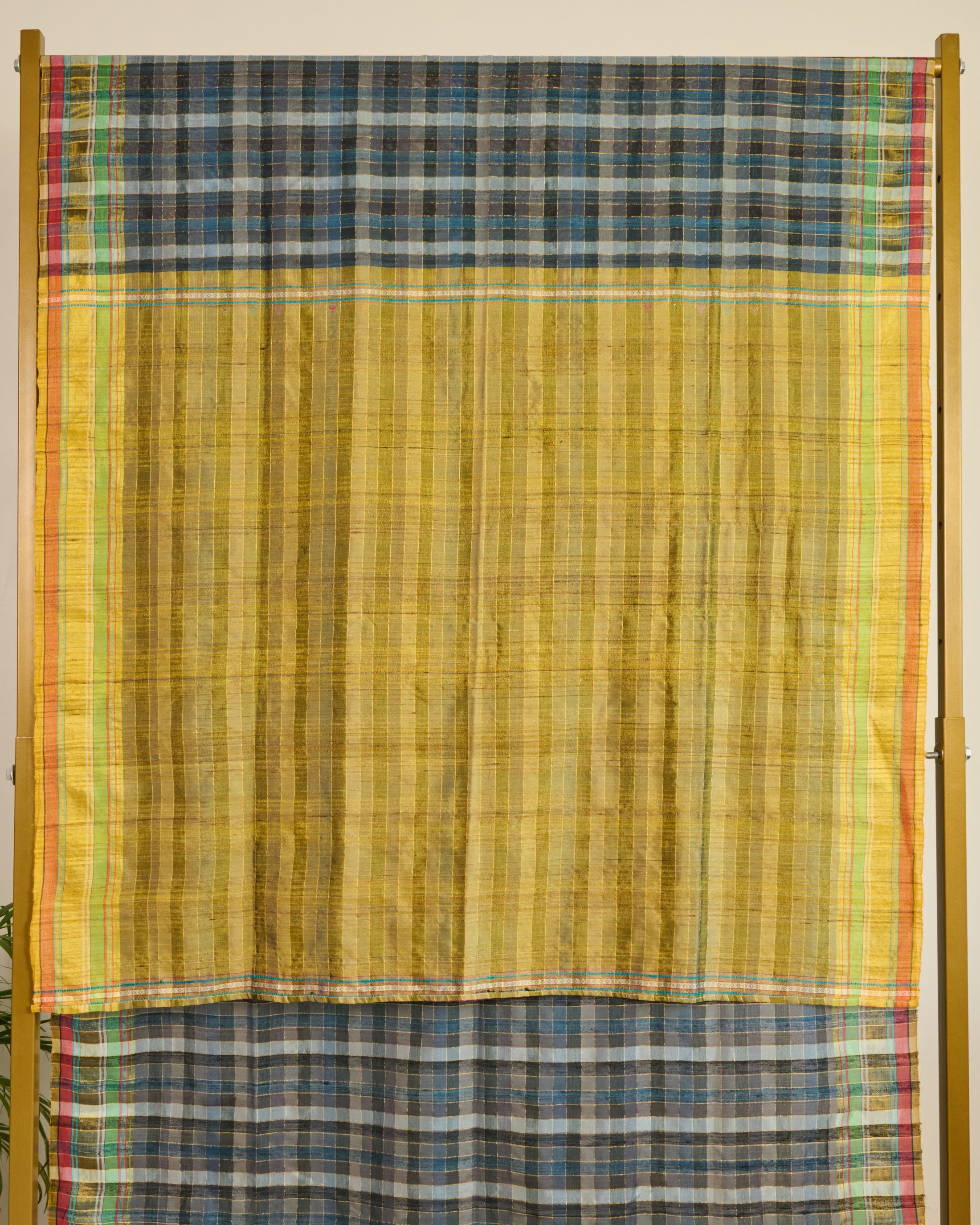 Bhujodi Silk Saree hanging on display