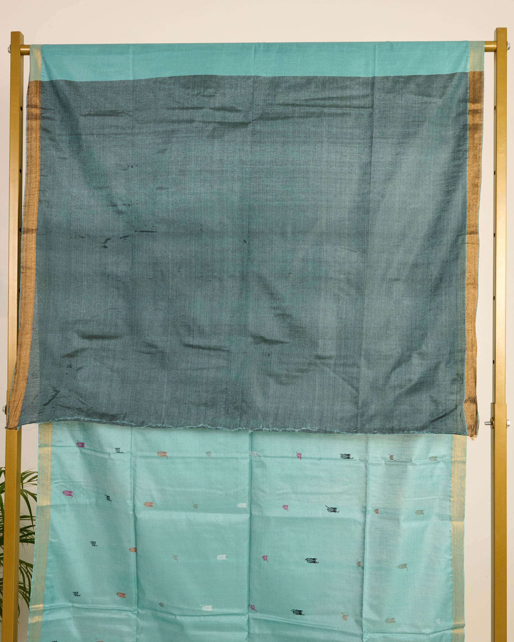 Blue Kosa Silk Saree with colourful silk thread extra weft motifs on display 