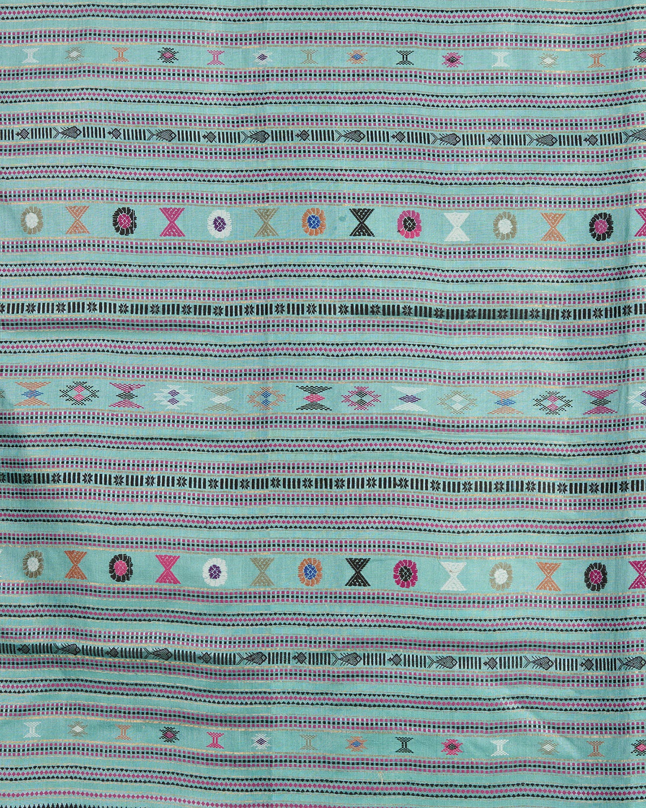 close up of a blue Kosa Silk Saree with colourful silk thread extra weft motifs on display 