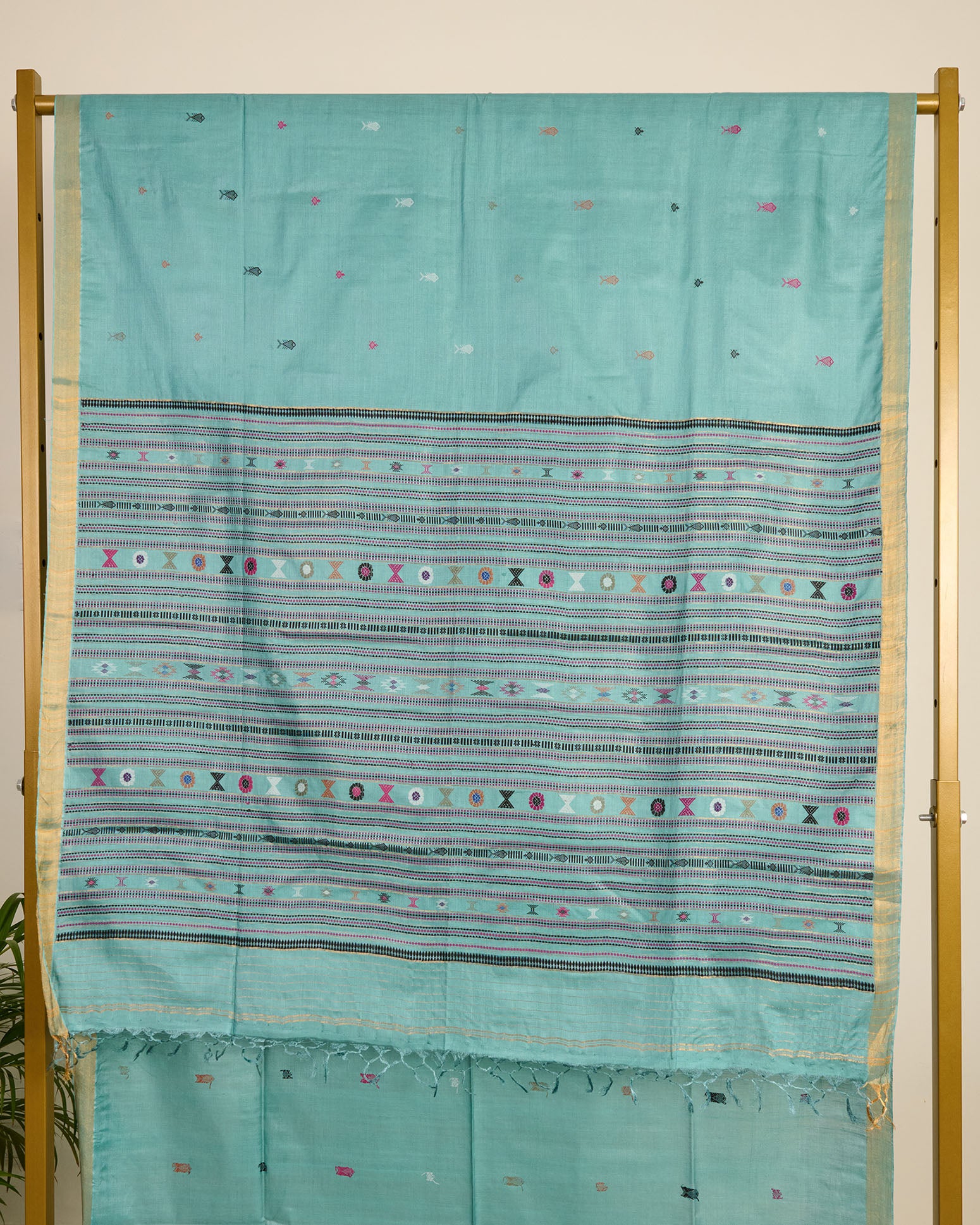 Blue Kosa Silk Saree with colourful silk thread extra weft motifs on display 