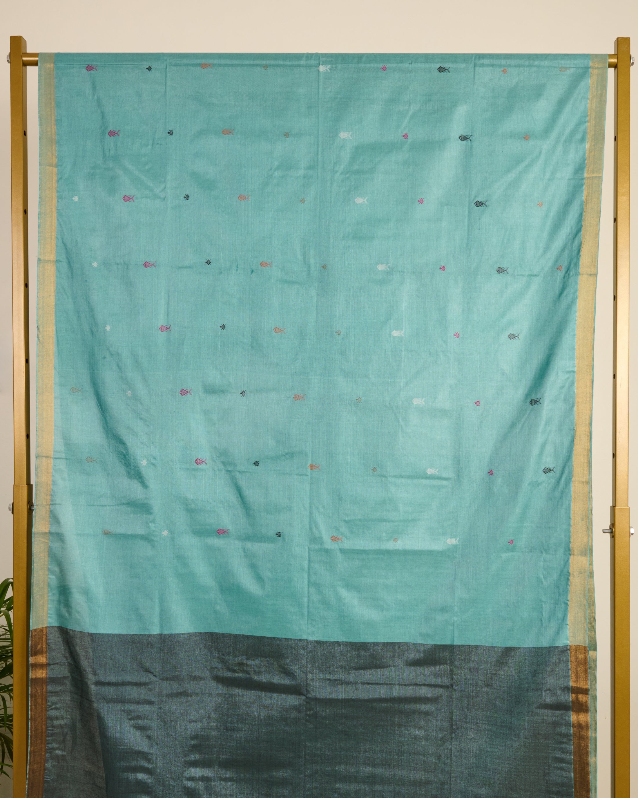 Blue Kosa Silk Saree with Extra Weft Motifs on display