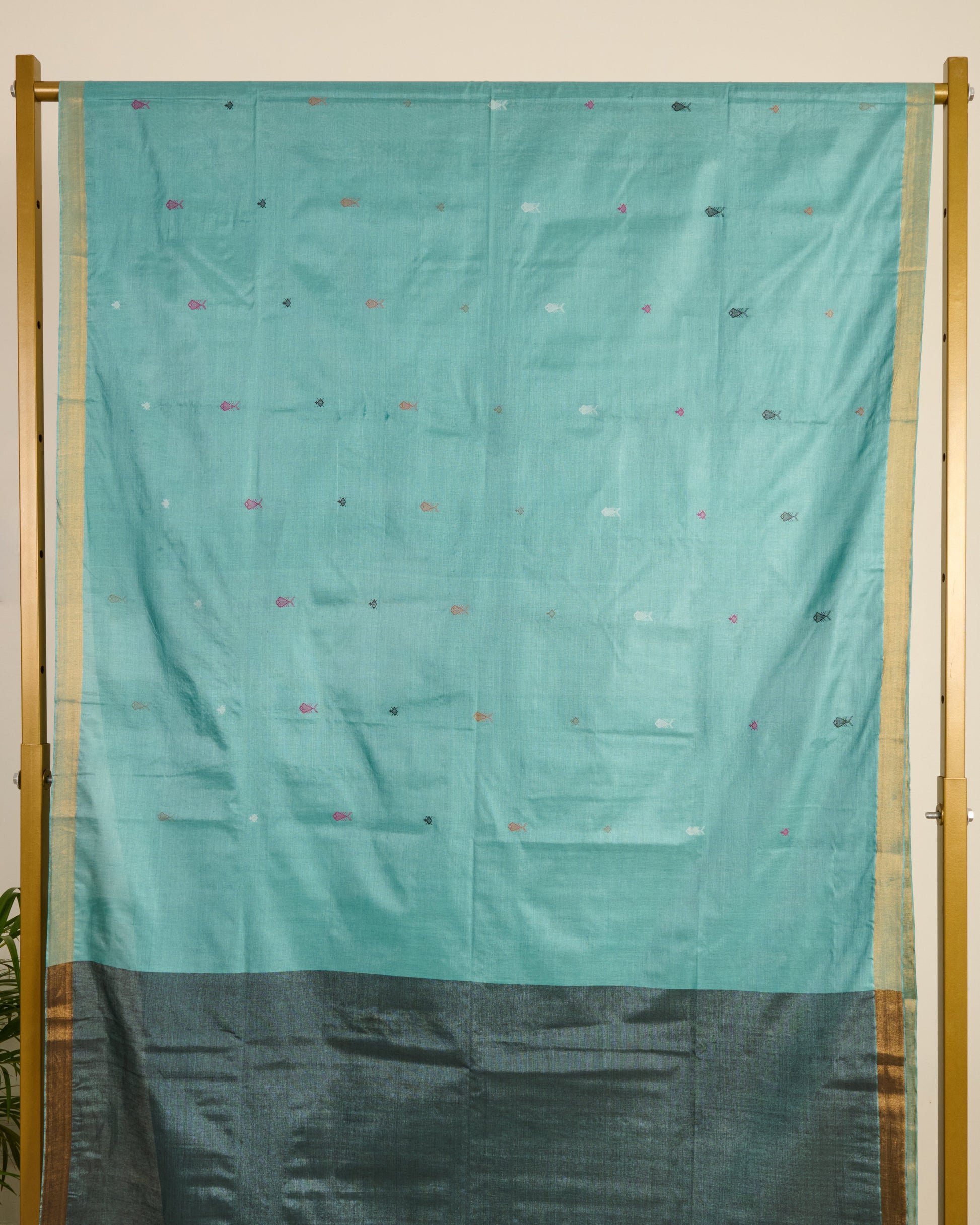 Blue Kosa Silk Saree with Extra Weft Motifs on display