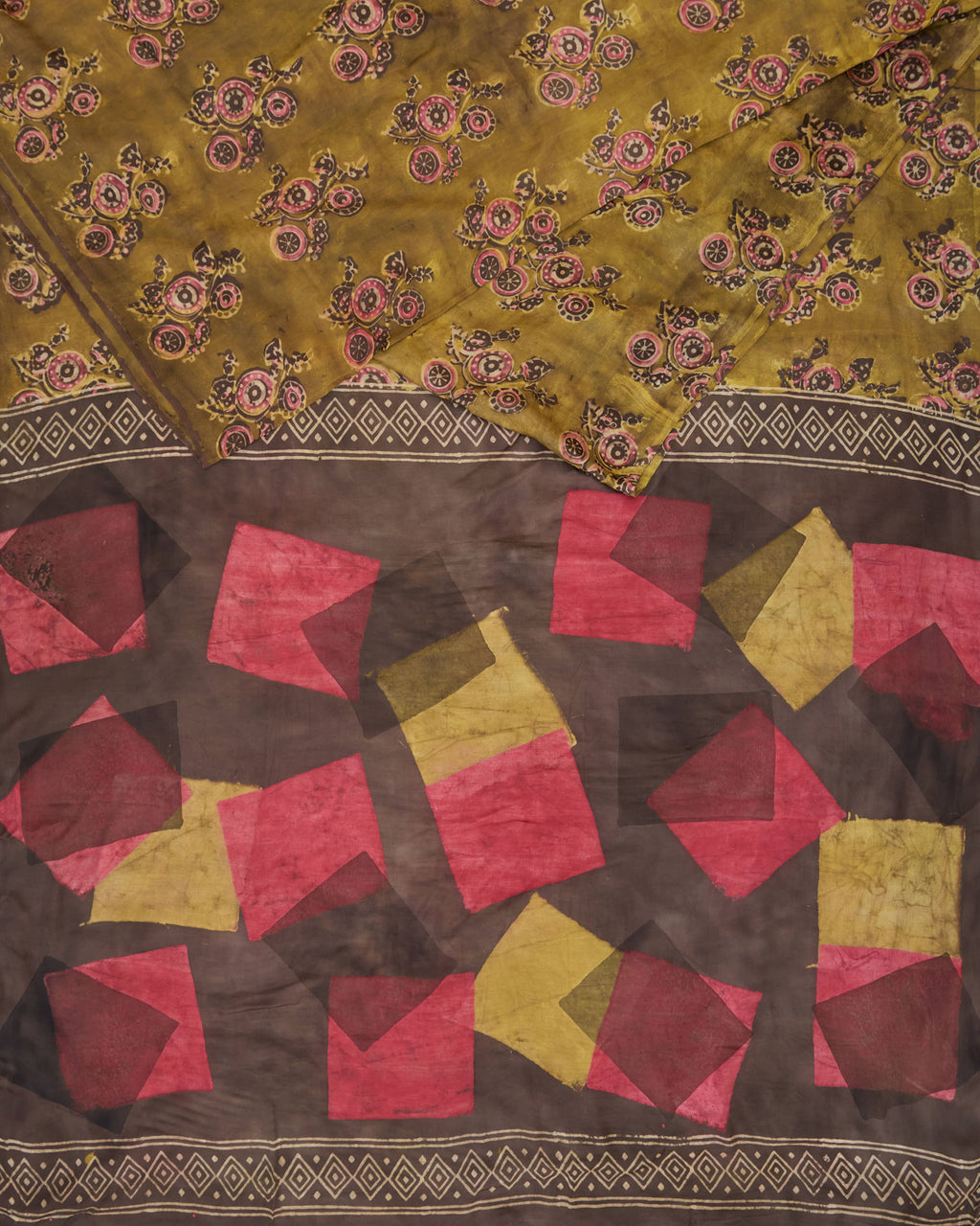 A natural dye dabu block print saree in tussar by modal saree in yellow and brown combination 