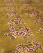 A natural dye dabu block print saree in tussar by modal saree in yellow and brown combination 