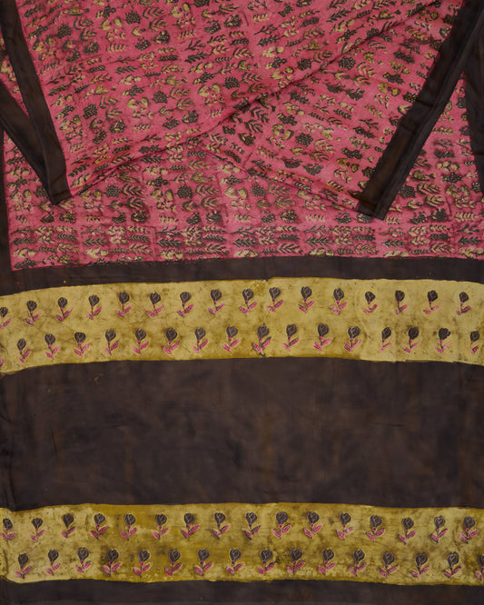A natural dye dabu handblock print saree in tussar by modal fabric in pink and yellow combination.