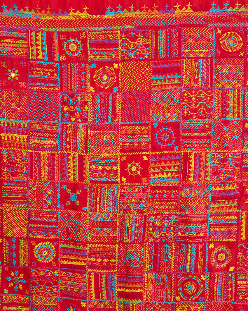 Close up of the Lambani embroidery on the pallu of Red Kosa silk saree.