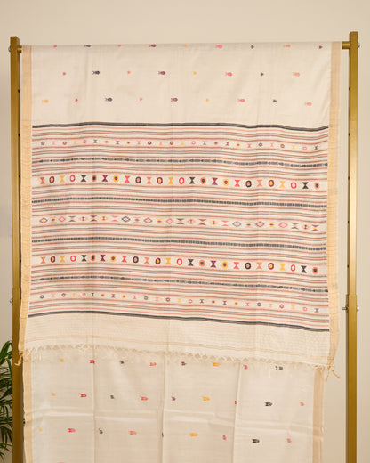 Kosa silk saree in ivory shade with extra weft motifs on display