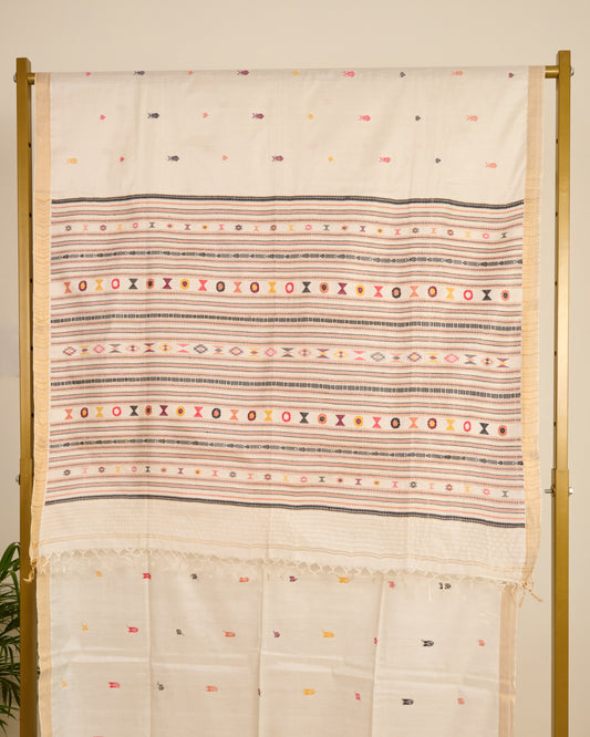 Kosa silk saree in ivory shade with extra weft motifs on display