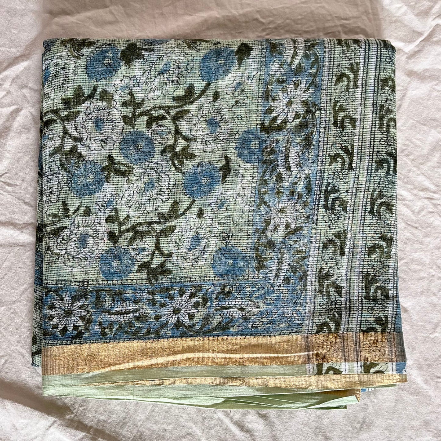 Mint Green kota cotton saree with Sanganeri blockprint.