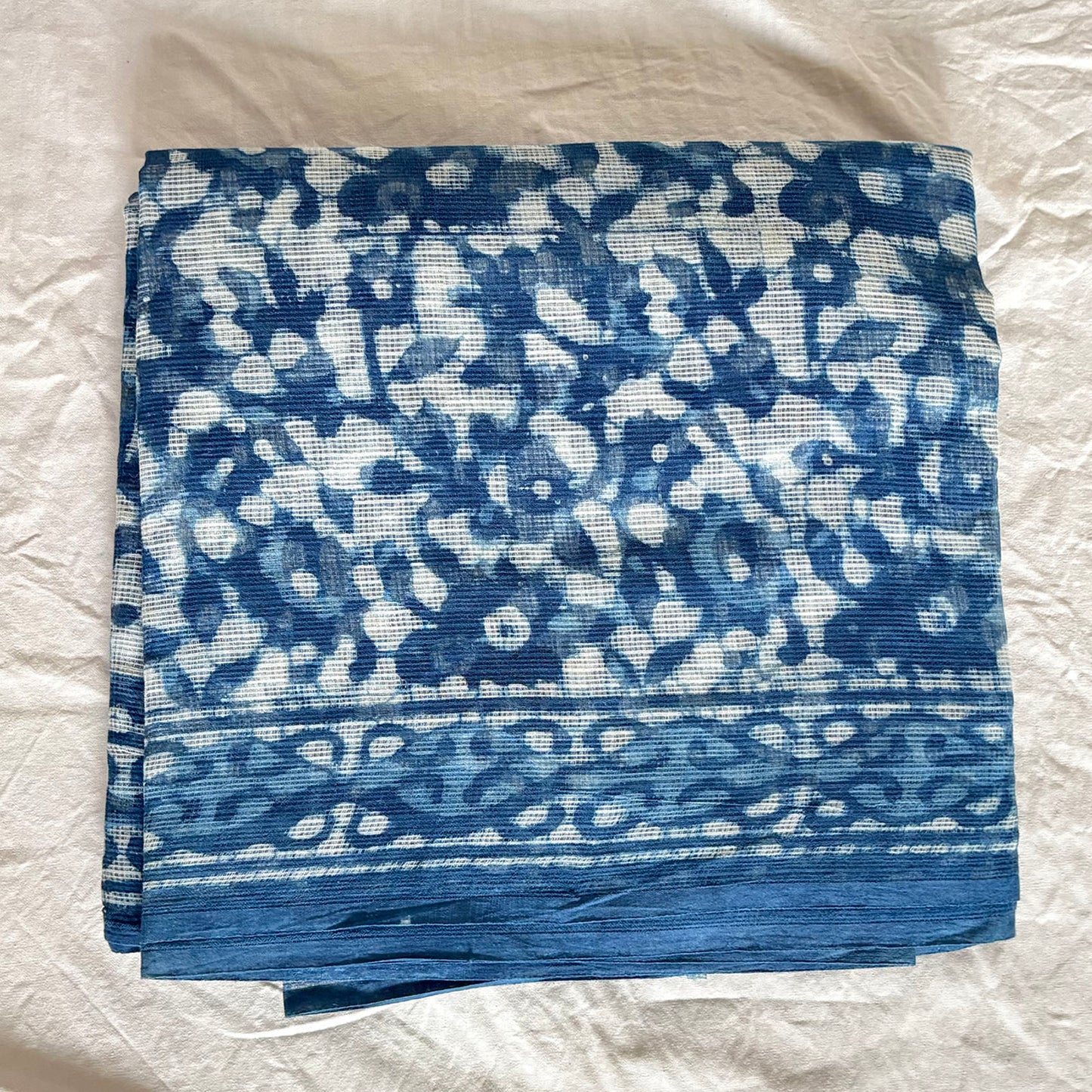 Indigo and white dabu blockprint kota cotton saree.