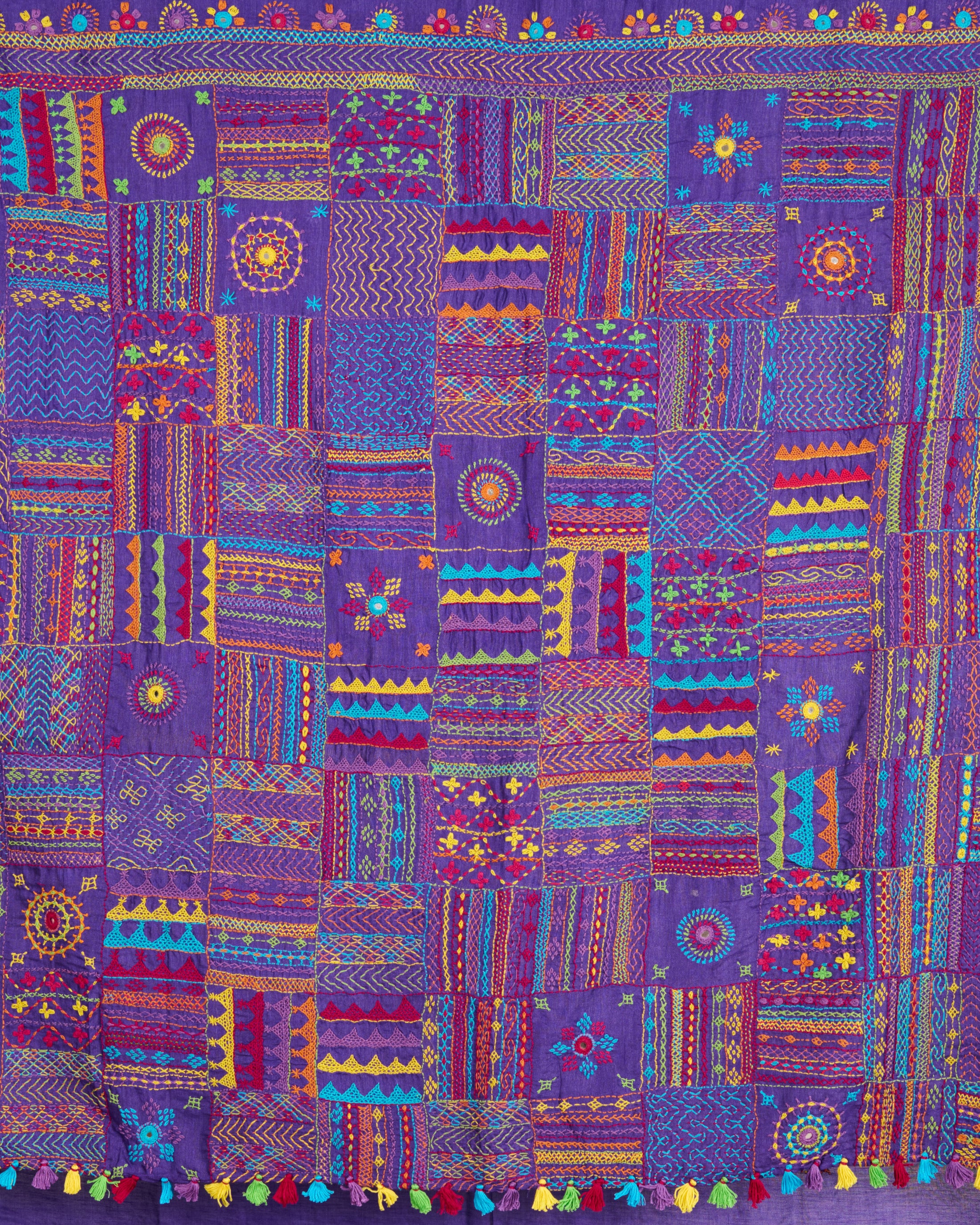 Lambani Embroidery on Kosa Silk Saree on display close up of the embroidery