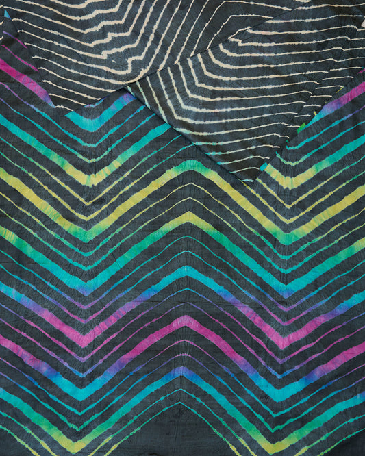 A black leheriya saree with multicolour leheriya on pallu