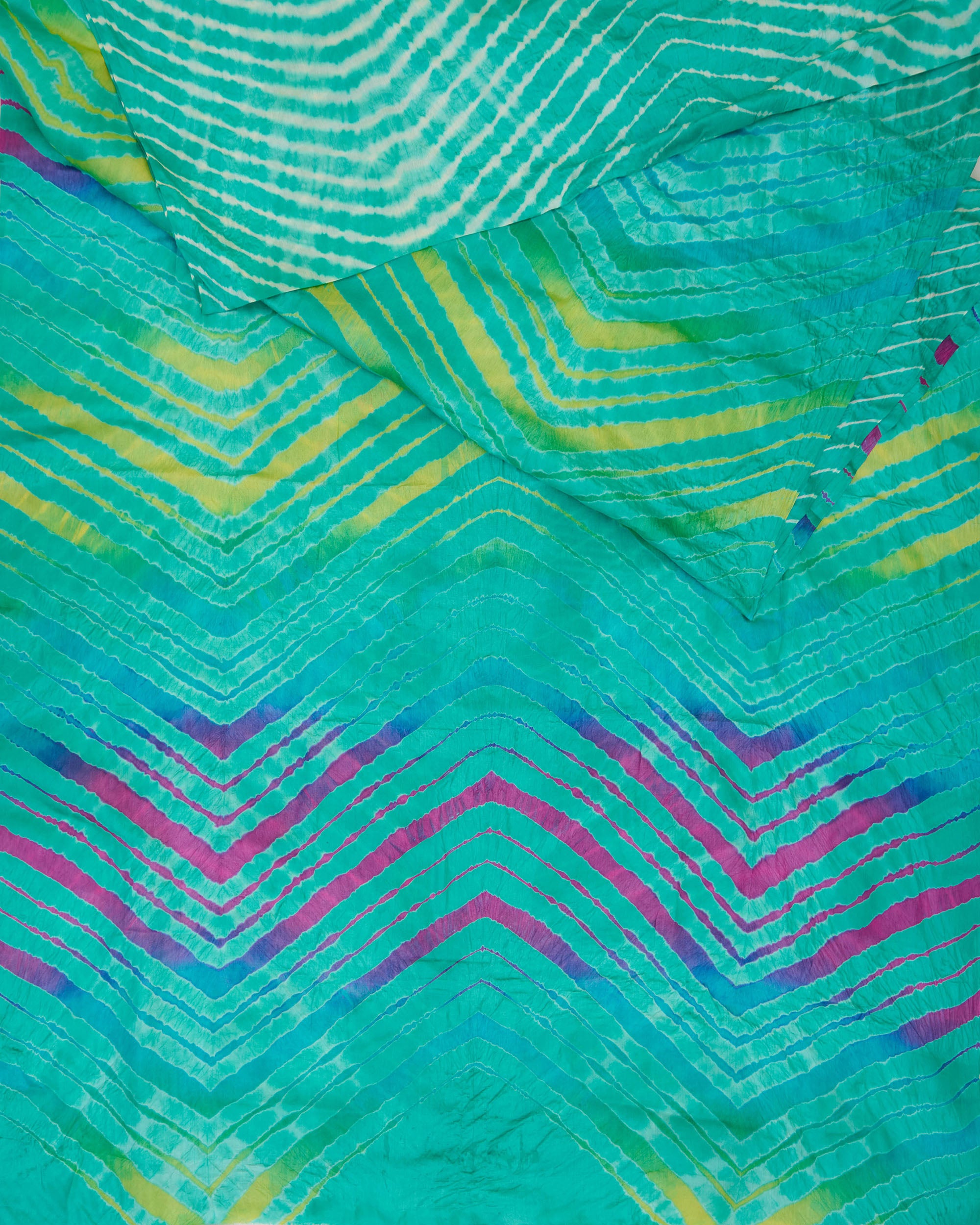A sea green leheriya saree with multicolour leheriya on pallu