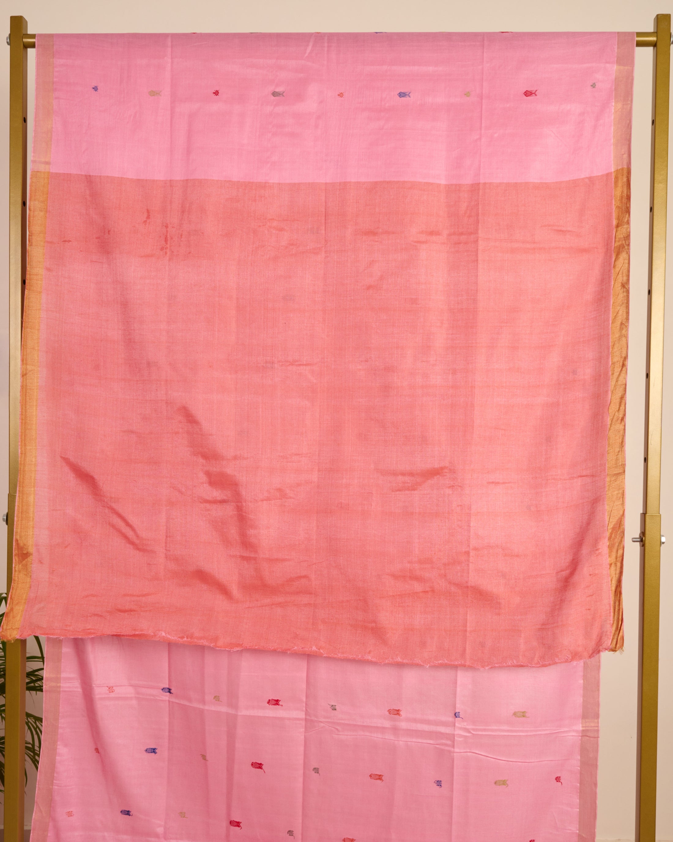 Pink Kosa Silk Saree with Extra Weft Motifs on display