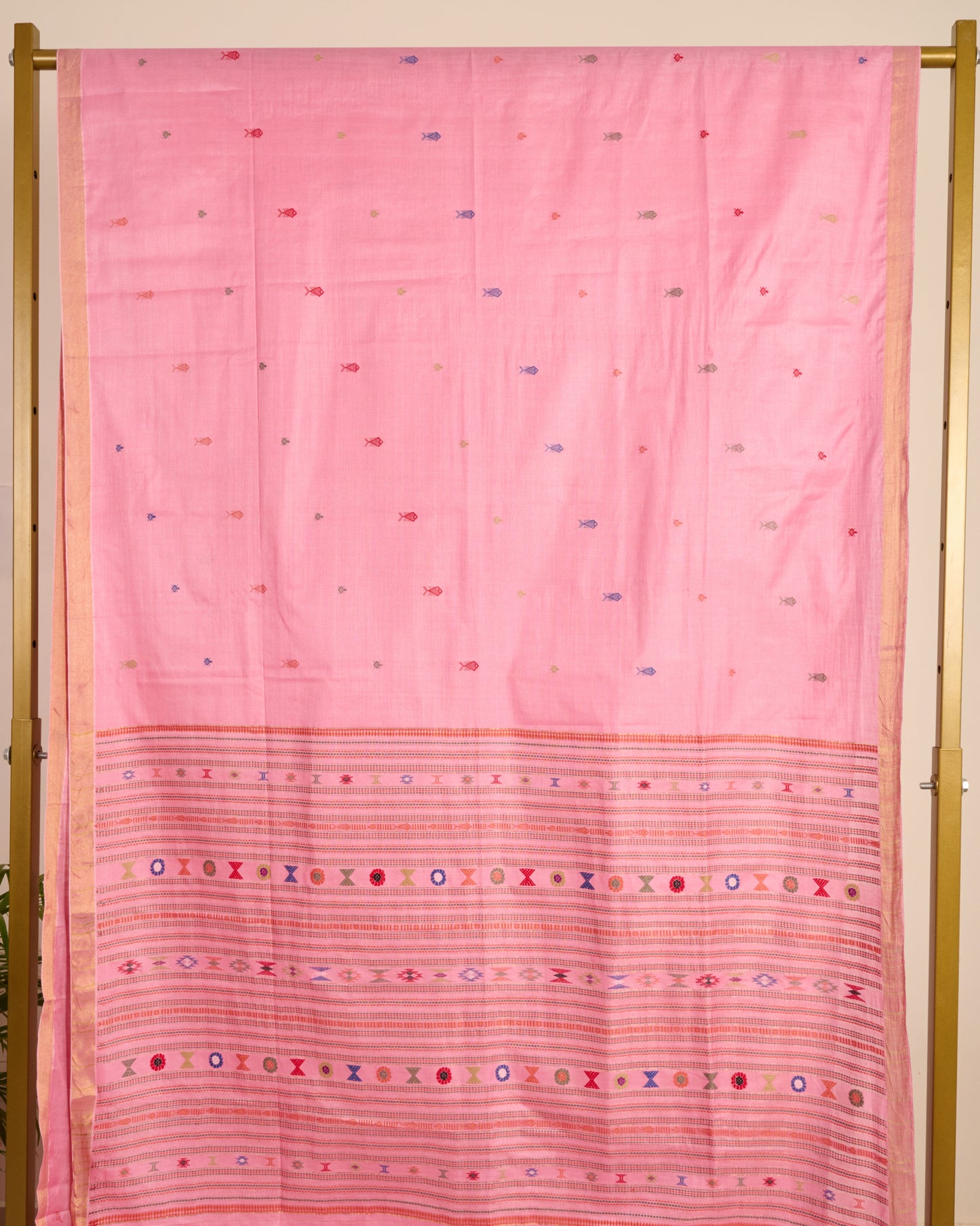 Pink Kosa Silk Saree with Extra Weft Motifs displayed on stand