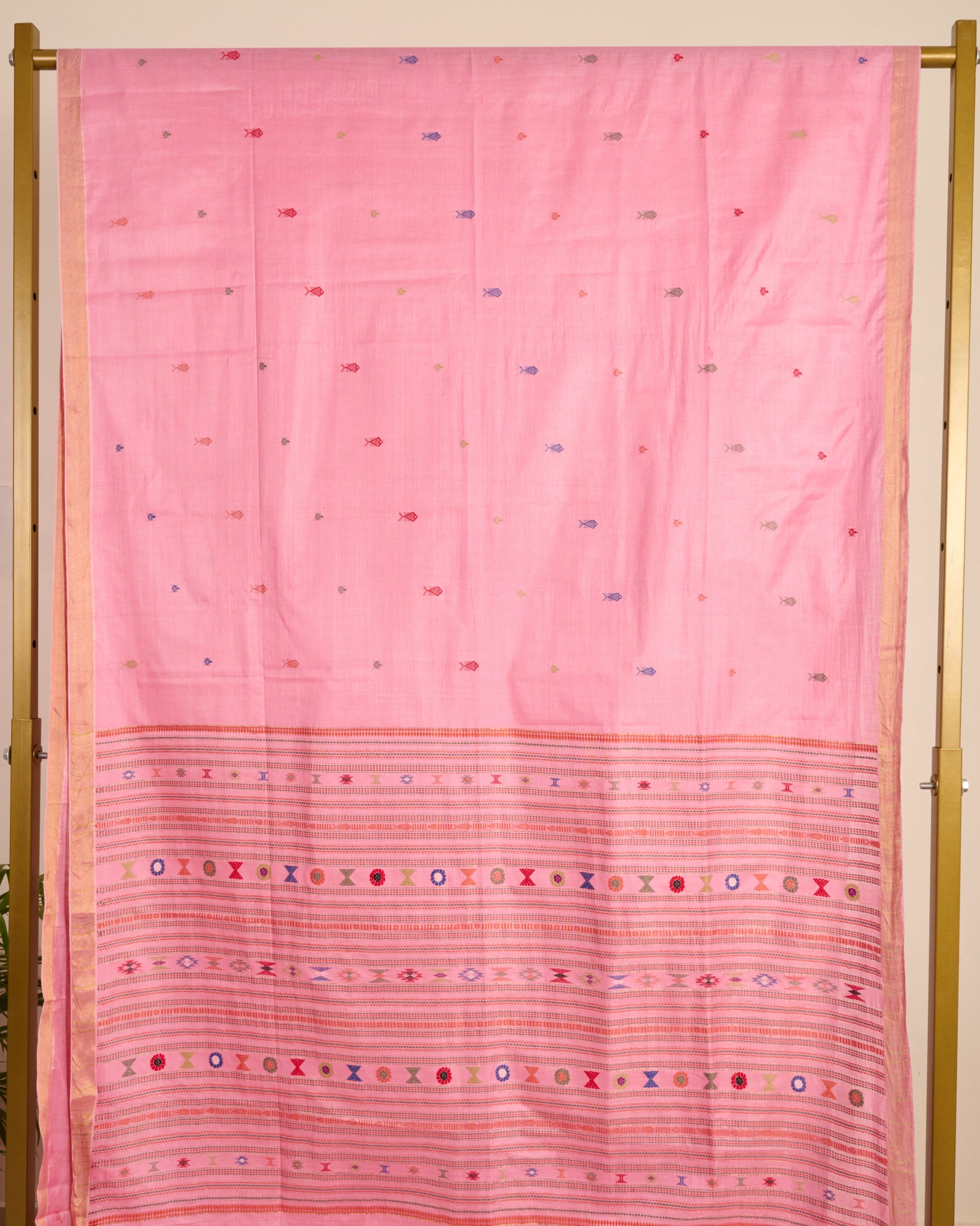 Pink Kosa Silk Saree with Extra Weft Motifs displayed on stand