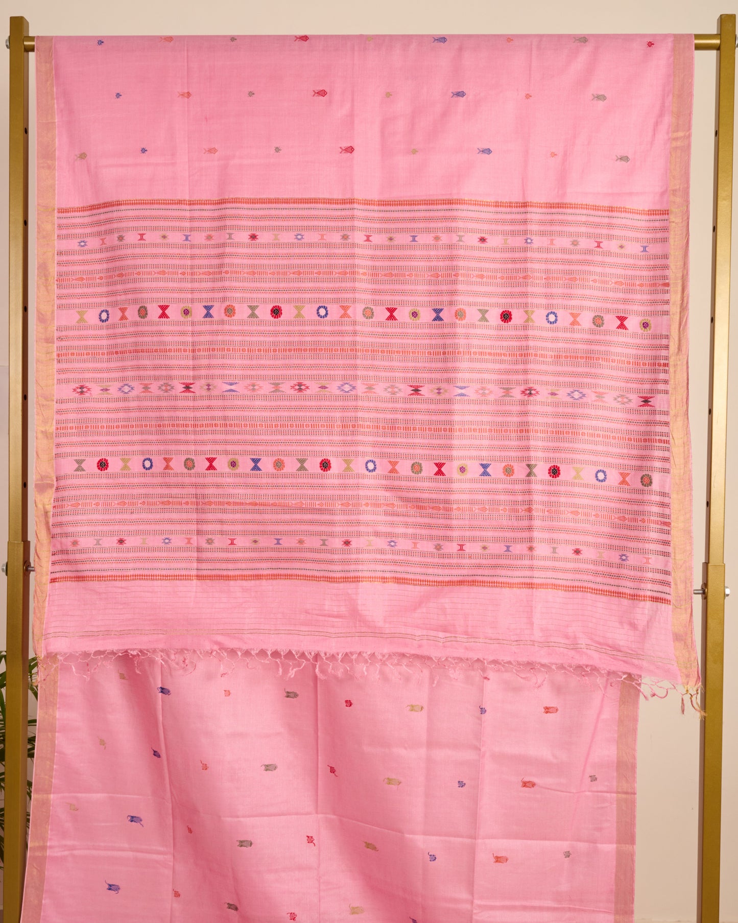 Pink Kosa Silk Saree with Extra Weft Motifs displayed on stand
