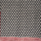 Black base cotton block printed saree with beige booti print all over and red border.